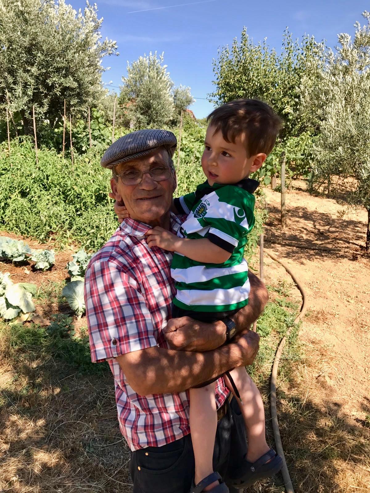 Julius with his grandfather on the farm